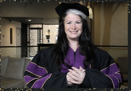 Maria Dolores in academic regalia after receiving an Honorary Doctorate of Humane Letters